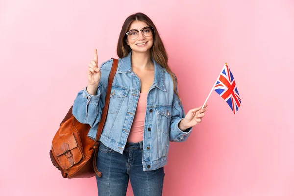 Young Woman Holding United Kingdom Flag Isolated Pink Background Showing — Zdjęcie stockowe