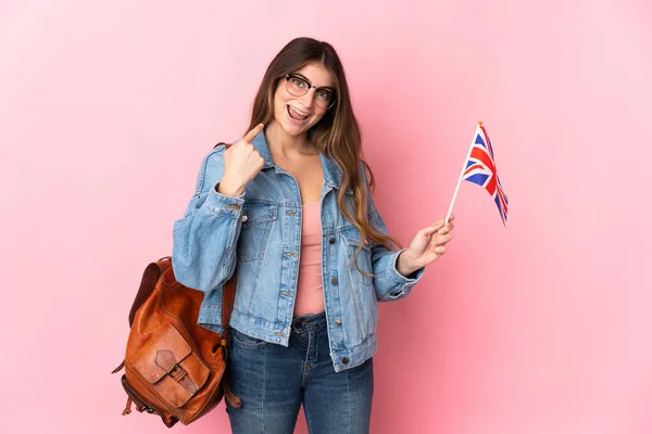 Young Woman Holding United Kingdom Flag Isolated Pink Background Giving — 스톡 사진