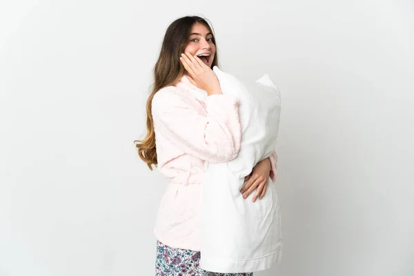 Young Caucasian Woman Isolated White Background Pajamas Holding Pillow Surprised — Stock fotografie