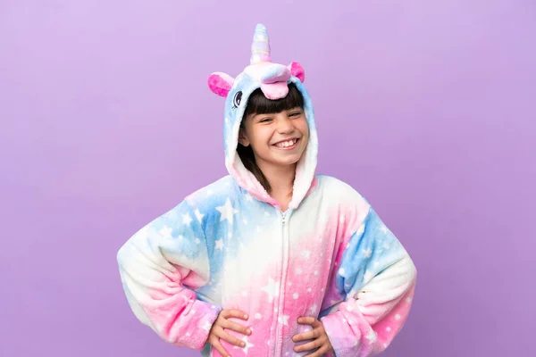 Little Kid Wearing Unicorn Pajama Isolated Purple Background Posing Arms — Zdjęcie stockowe