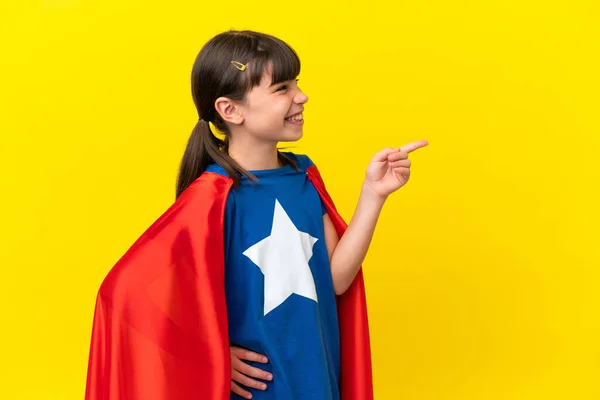 Little Super Hero Kid Isolated Purple Background Pointing Finger Side — Stock Photo, Image