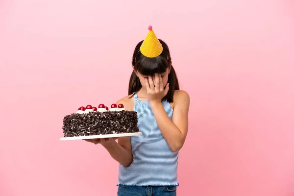 Little Caucasian Kid Holding Birthday Cake Isolated Pink Background Tired — Stock Fotó