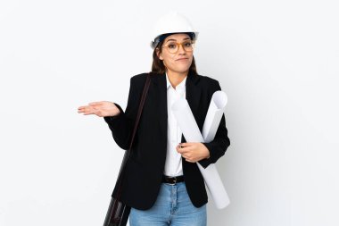 Young architect caucasian woman with helmet and holding blueprints over isolated background having doubts with confuse face expression