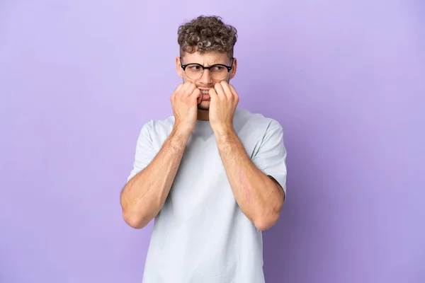 Delivery Caucasian Man Isolated Purple Background Nervous Scared Putting Hands — Stok fotoğraf