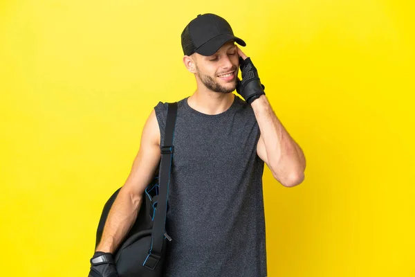 Young Sport Blonde Man Sport Bag Isolated Yellow Background Thinking — 图库照片