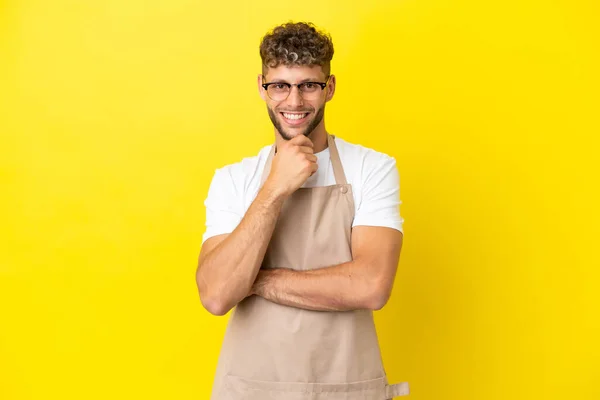 Restaurant Waiter Blonde Man Isolated Yellow Background Glasses Smiling — Zdjęcie stockowe