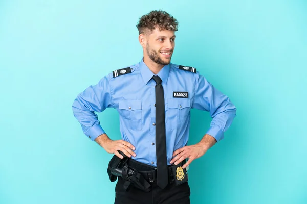 Young Police Blonde Man Isolated White Blue Background Posing Arms —  Fotos de Stock