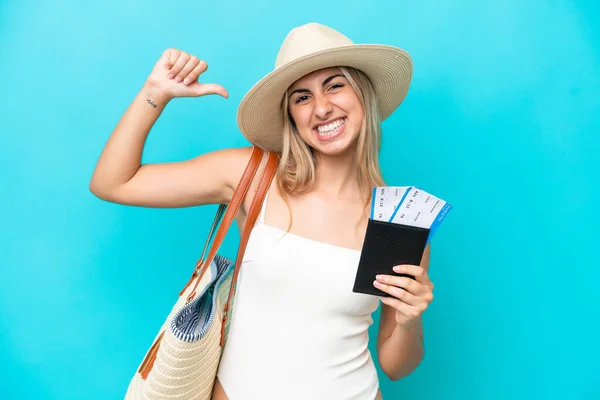 Young Caucasian Woman Swimsuit Holding Passport Isolated Blue Background Proud — Stock fotografie