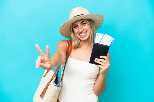 Young Caucasian Woman Swimsuit Holding Passport Isolated Blue Background Smiling — Stock fotografie