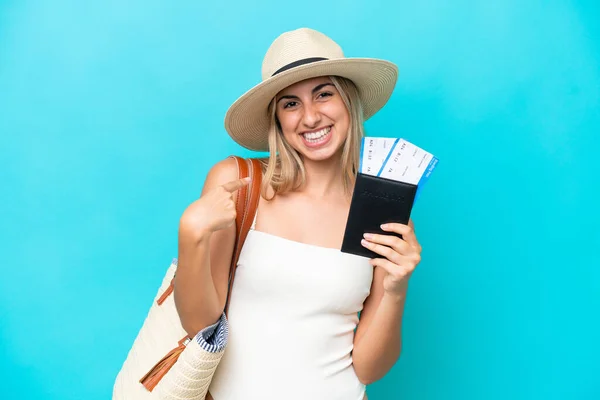 Young Caucasian Woman Swimsuit Holding Passport Isolated Blue Background Surprise — Stockfoto