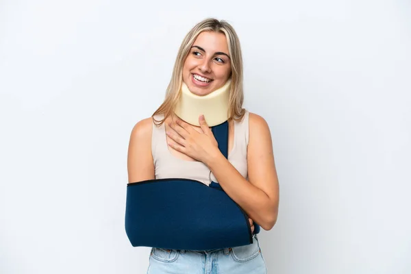 Woman Broken Arm Wearing Sling Isolated White Background Looking While —  Fotos de Stock