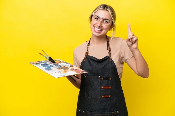 Young Artist Caucasian Woman Holding Palette Isolated Yellow Background Showing — ストック写真