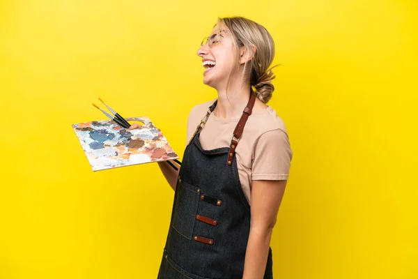 Young Artist Caucasian Woman Holding Palette Isolated Yellow Background Laughing — Foto de Stock