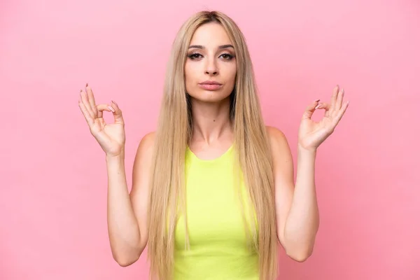 Pretty Blonde Woman Isolated Pink Background Zen Pose — 스톡 사진