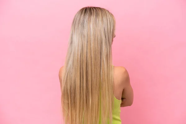 Pretty Blonde Woman Isolated Pink Background Back Position Looking Side — Fotografia de Stock