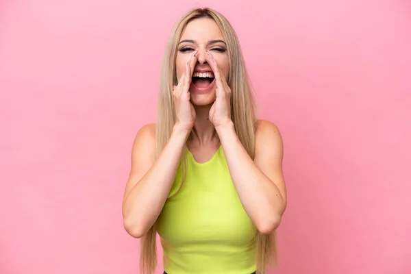 Pretty Blonde Woman Isolated Pink Background Shouting Announcing Something — Stockfoto