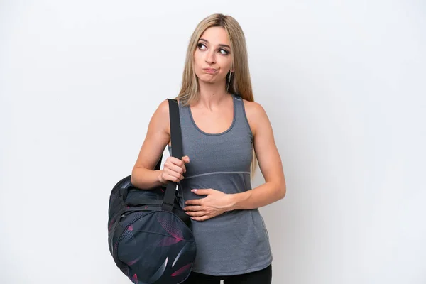 Young Sport Woman Sport Bag Isolated White Background Making Doubts — Stock Fotó