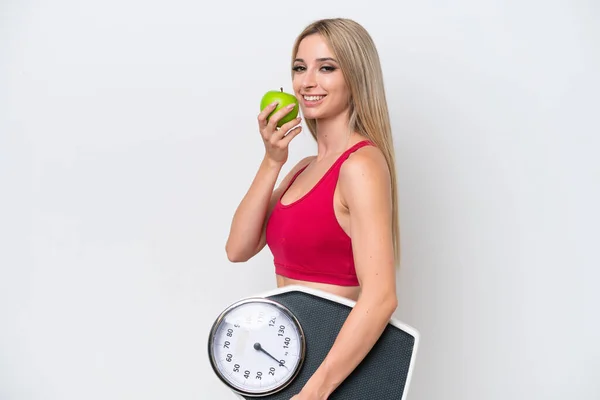 Pretty Blonde Woman Isolated White Background Weighing Machine Apple — Stock Fotó