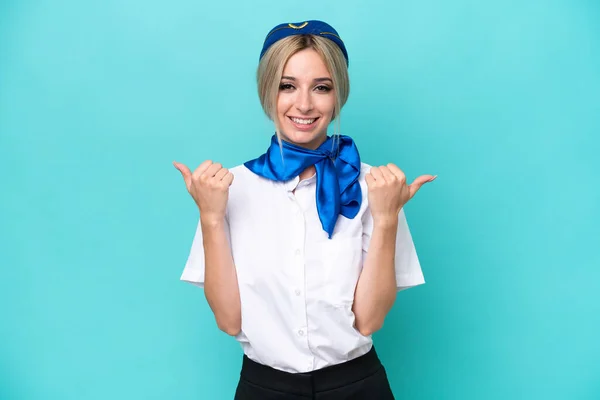 Airplane Blonde Stewardess Woman Isolated Blue Background Thumbs Gesture Smiling — Stock Photo, Image