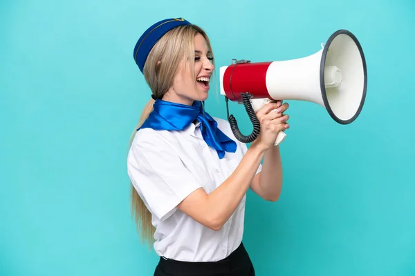 Airplane Blonde Stewardess Woman Isolated Blue Background Shouting Megaphone Stock Picture