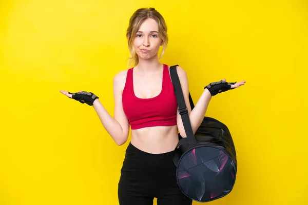 Young Sport Caucasian Woman Sport Bag Isolated Background Having Doubts — Stock Fotó
