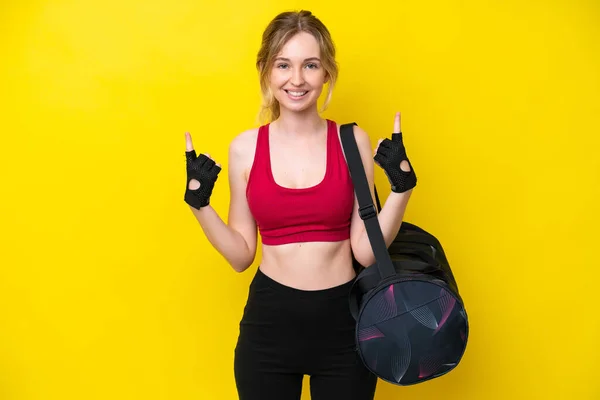 Young Sport Caucasian Woman Sport Bag Isolated Background Pointing Great — Fotografia de Stock