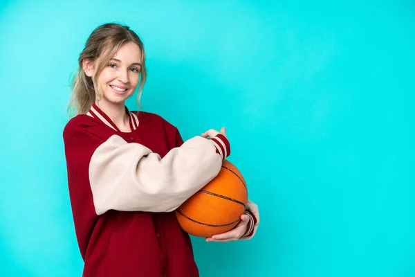 Young Basketball Player Caucasian Woman Isolated Blue Background Pointing Back — Stok fotoğraf