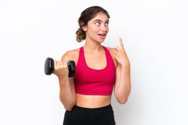 Young sport caucasian woman making weightlifting isolated on white background thinking an idea pointing the finger up