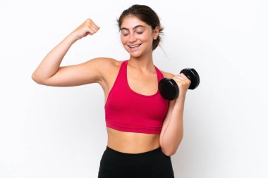 Young sport caucasian woman making weightlifting isolated on white background doing strong gesture