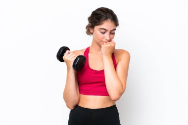Young sport caucasian woman making weightlifting isolated on white background having doubts