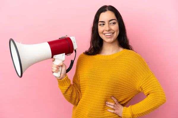 Young Caucasian Woman Isolated Pink Background Holding Megaphone Thinking — Stockfoto