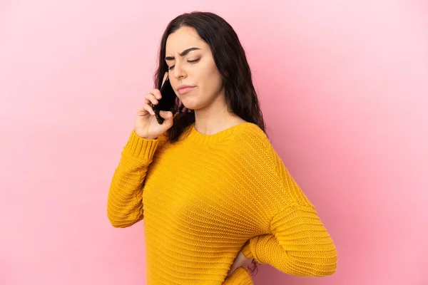 Young Caucasian Woman Using Mobile Phone Isolated Pink Background Suffering — Stock fotografie