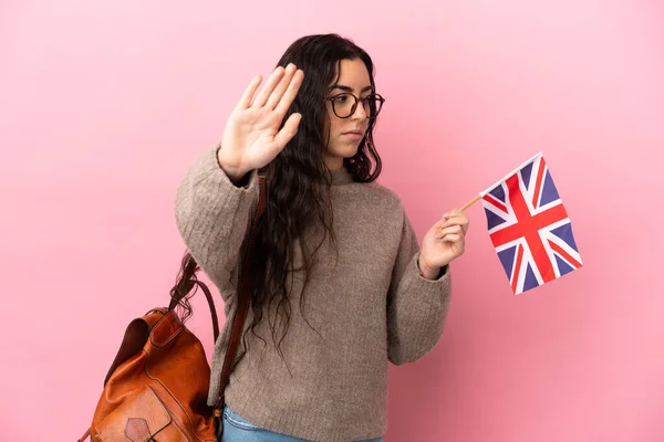 Young Caucasian Woman Holding United Kingdom Flag Isolated Pink Background — Stock fotografie