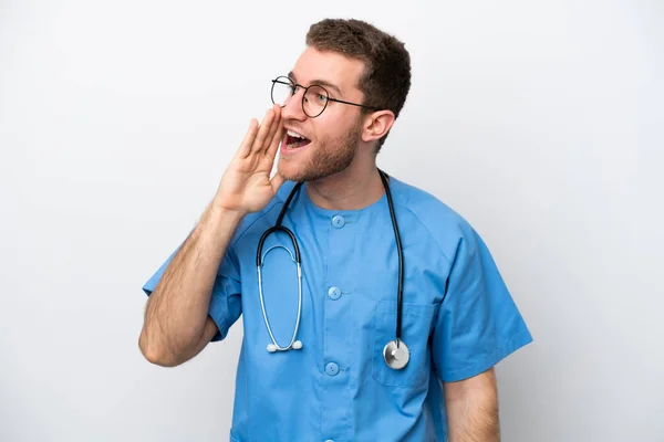 Young Surgeon Doctor Caucasian Man Isolated White Background Shouting Mouth — Photo