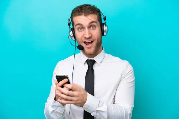 Telemarketer Caucasian Man Working Headset Isolated Blue Background Surprised Sending — Photo