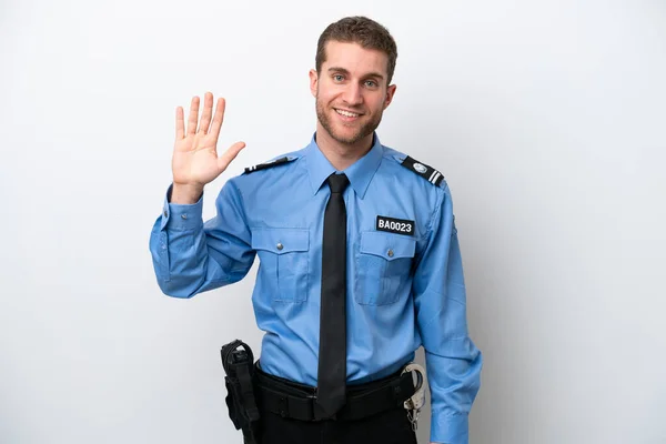 Young Police Caucasian Man Isolated White Background Saluting Hand Happy — стоковое фото