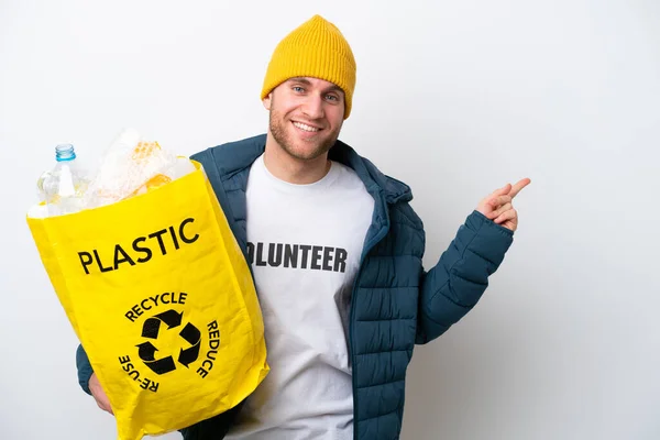 Young Caucasian Holding Bag Full Plastic Bottles Recycle Isolated White — 스톡 사진