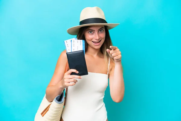 Young Woman Swimsuit Holding Passport Isolated Blue Background Points Finger — Stock fotografie
