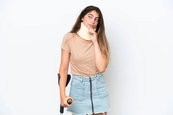 Young Caucasian Woman Wearing Neck Brace Crutch Isolated White Background — Stockfoto