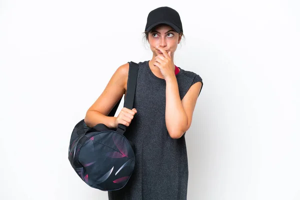 Young Sport Woman Sport Bag Isolated White Background Having Doubts — Stockfoto