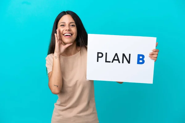 Young Woman Isolated Background Holding Placard Message Plan Shouting — Stockfoto