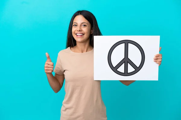 Young Woman Isolated Background Holding Placard Peace Symbol Thumb —  Fotos de Stock