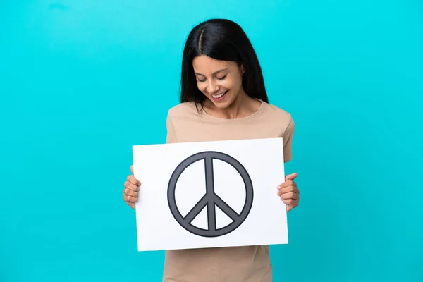 Young Woman Isolated Background Holding Placard Peace Symbol —  Fotos de Stock