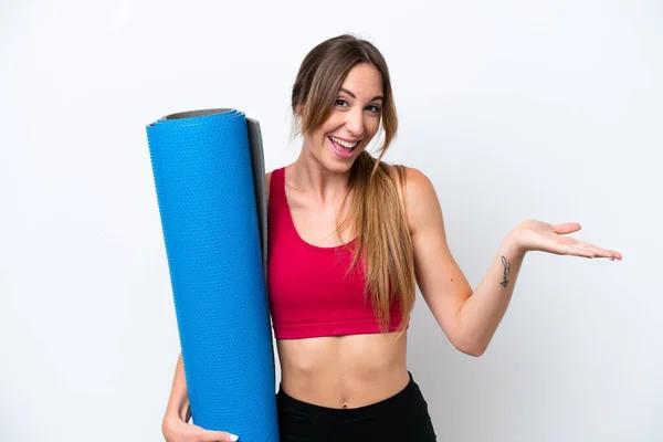 Young Sport Woman Going Yoga Classes While Holding Mat Isolated — Foto Stock