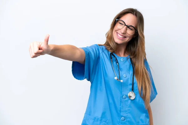 Młoda Chirurg Lekarz Kobieta Odizolowany Niebieskim Tle Dając Kciuki Górę — Zdjęcie stockowe