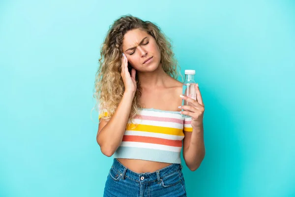 Young Blonde Woman Bottle Water Isolated Blue Background Headache —  Fotos de Stock