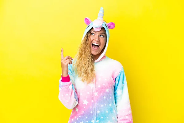 Girl Curly Hair Wearing Unicorn Pajama Isolated Yellow Background Pointing — Stock Photo, Image