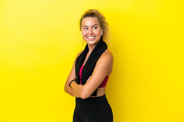 Sport Woman Towel Isolated Yellow Background Arms Crossed Happy — Stockfoto