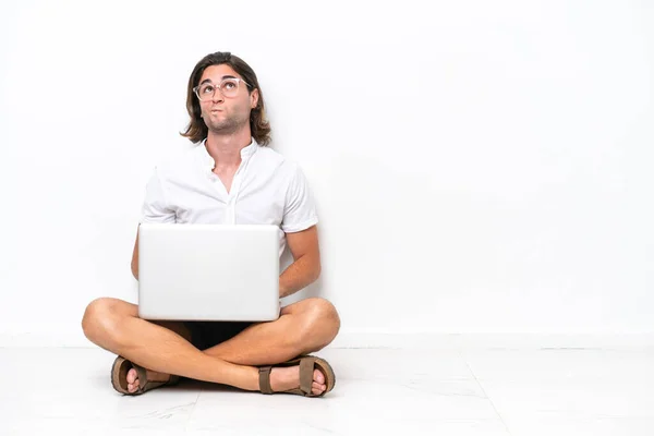 Young Handsome Man Laptop Sitting Floor Isolated White Background Looking — Foto de Stock