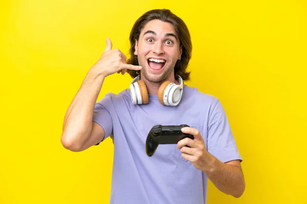 Young Handsome Caucasian Man Playing Video Game Controller Isolated Yellow —  Fotos de Stock
